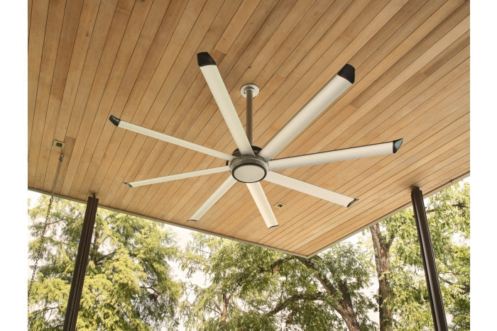 An image of a large, silver 8-blade fan attached to a wood ceiling.