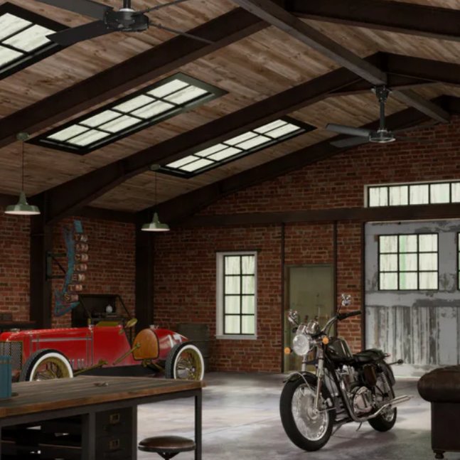Interior of a rustic wooden garage featuring a vintage car and motorcycle.